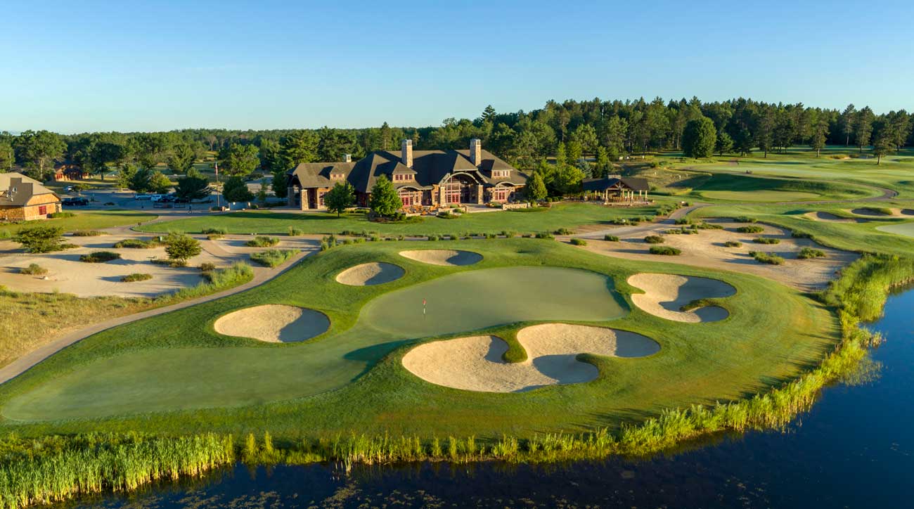 The clubhouse at Forest Dunes is a dramatic backdrop for a round's conclusion.