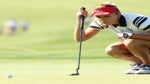 lexi thompson reads a putt at the solheim cup